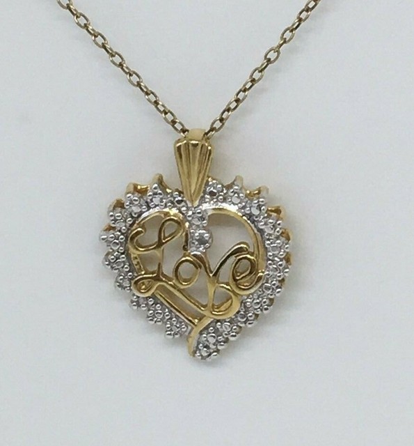 STERLING SILVER AND DIAMOND ACCENTS ''LOVE'' HEART PENDANT SIGNED JCM