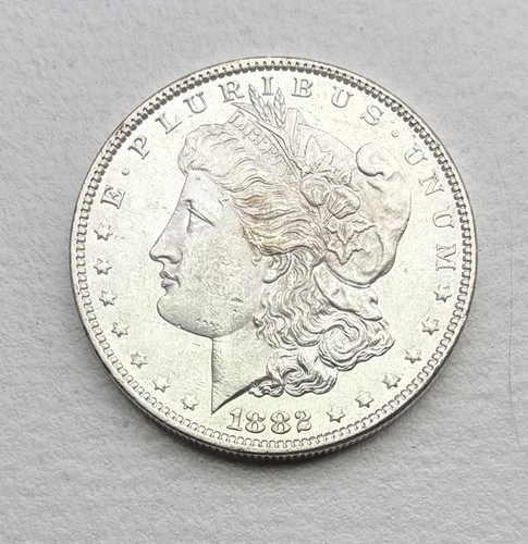 1882 Morgan Silver Dollar $1 Coin In UNC Condition - High Value Coin!