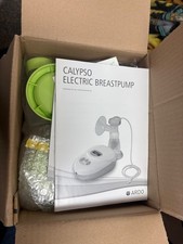 calypso breast pump, green and white brand new never taken out of box