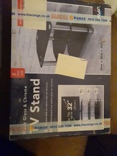Boxed TV Stand Black Tempered Glass and Chrome Legs Suitable For Upto 32" 81cm..