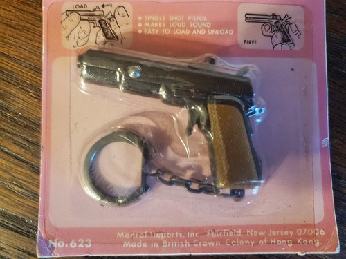 Captain Jack Army .45 cap Pistol Keychain solid Die-cast metal-NOS- faded Card - Picture 5 of 5