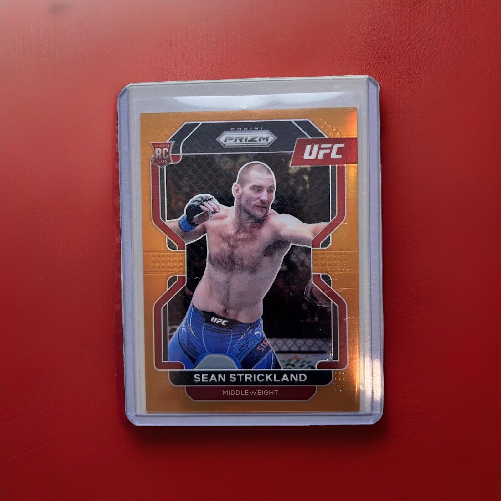 SEAN STRICKLAND 2022 PANINI PRIZM UFC ROOKIE ORANGE RC /99