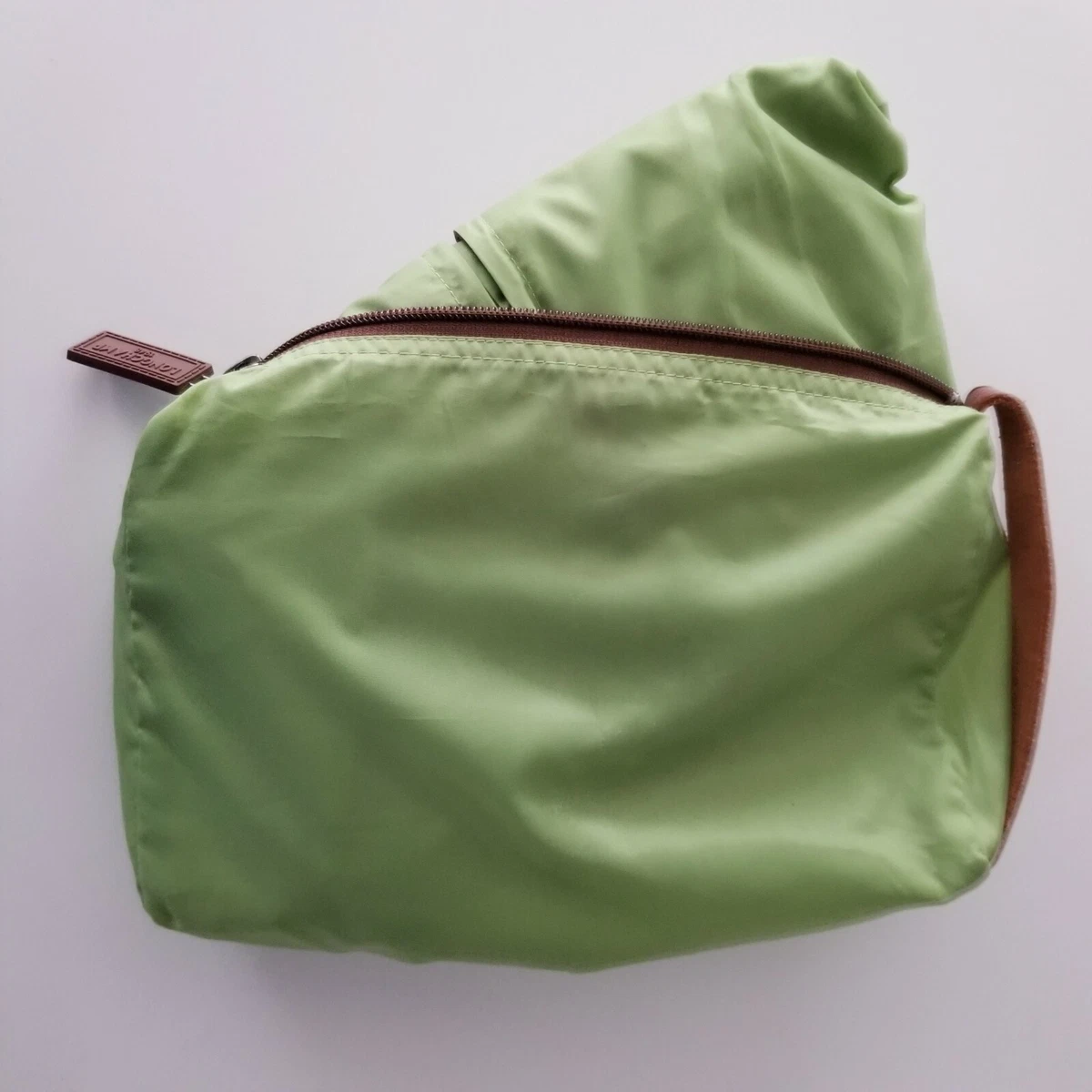 Longchamp raincoat hotsell