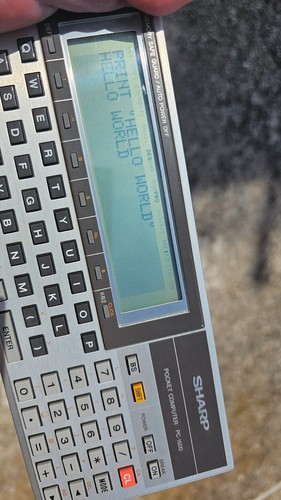 SHARP PC-1600, very nice, in working order w/ Original Pouch. Pocket Computer.