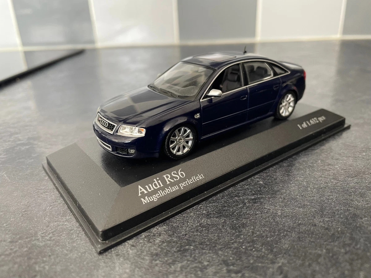 Minichamps 1:18 BMW i7 (G70) Année de construction 2022 noir métallique / rouge métallique