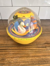 Carrusel musical vintage Fisher Price Toys amarillo Roly Poly Chime Ball bebé
