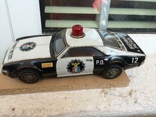 Antiguo juguete de hojalata de coche de policía a batería Taiyo Japón