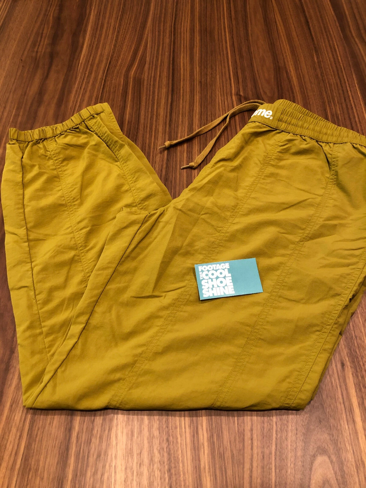 PANTALON COUPE VENT VINTAGE SUPREME DRABE VERT OLIVE BOÎTE BLANCHE LOGO NEUF XL