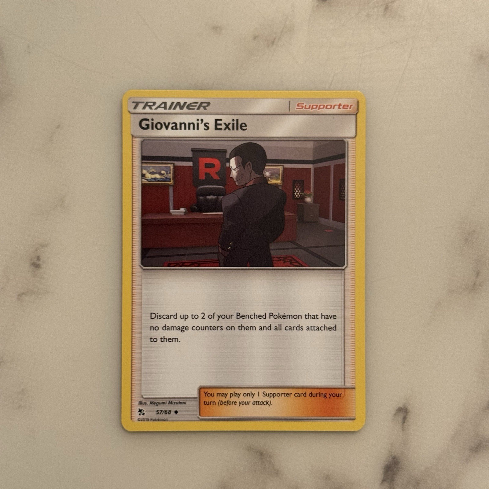 Giovanni's Exile 57/68 NM Hidden Fates Pokemon Card