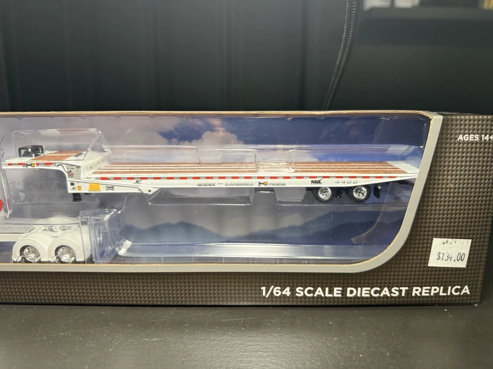1/64 DCP white Peterbilt 389  with white Landoll slide axle flatbed trailer - Image 4 of 4