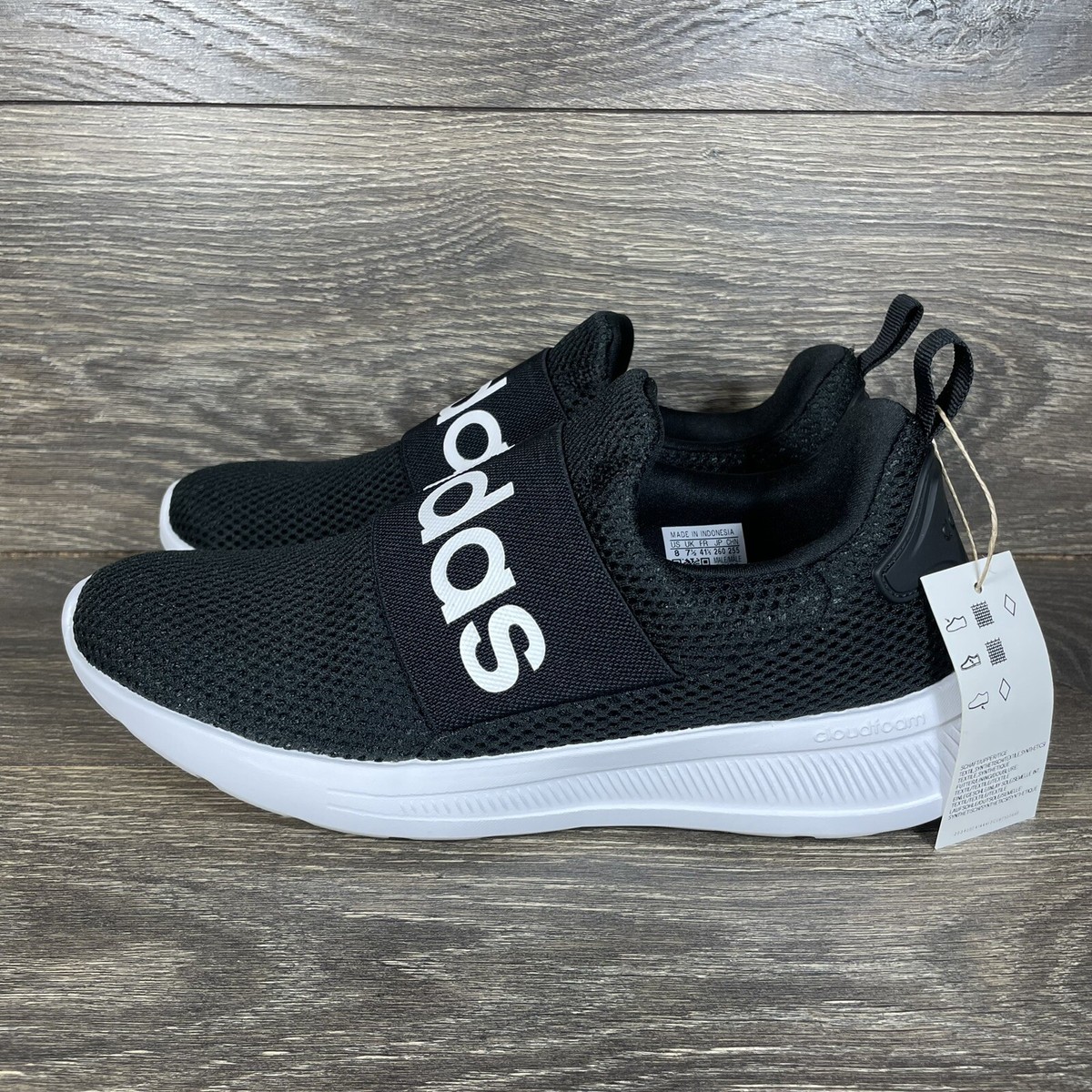 black adidas slip ons