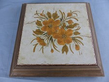 Ancien dessous de plat musical , boite a musique + cléf , fonctionne