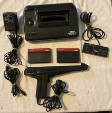 Sega Master System II Console with Light Phaser, Control Pad and 2 Games Working