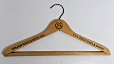 wood clothes hangar advertising Sheraton hotels and motor inns