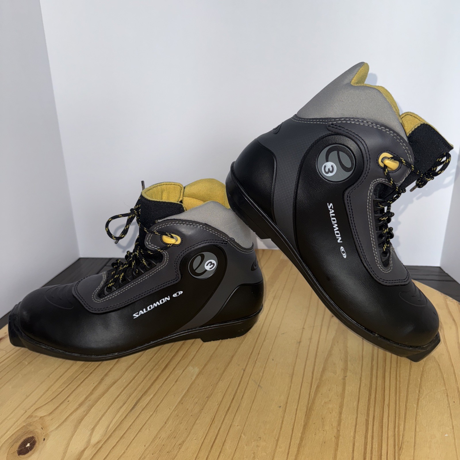 Scarponi da sci di fondo Salomon e3 uomo 7 5 nero giallo profilo SNS