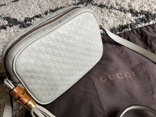 Gucci Microguccissima GG embossed leather bamboo tassel camera bag