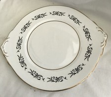 Gladstone fine bone china cake plate, eared, gilded with black scrolls, Art Deco