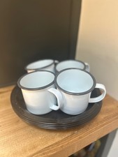 Set of 4 White Enamel Camping Mugs with Black Speckled Plates