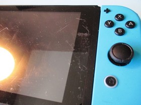 Nintendo Switch System Console w/Red & Blue Joy-Cons + Dock & Extras