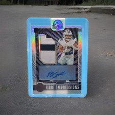 2023 Panini Illusions - 1st Impressions Auto Memorabilia Deuce Vaughn  Black /50