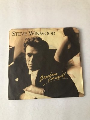 Steve Winwood - Freedom Overspill / Help Me Angel - 45 Island 1986 7-28595