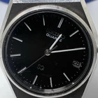 Vintage 1982 Seiko 8222-8000 men's quartz watch black dial date stainless steel
