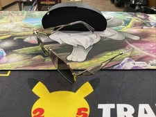 Prada Sunglasses SPRA51 Silver Hexagon Frames w/ Brown Gradient Lenses