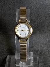 Caravelle Quartz Women's Vintage Dress Quartz Analog Gold Bracelet Silver Dial