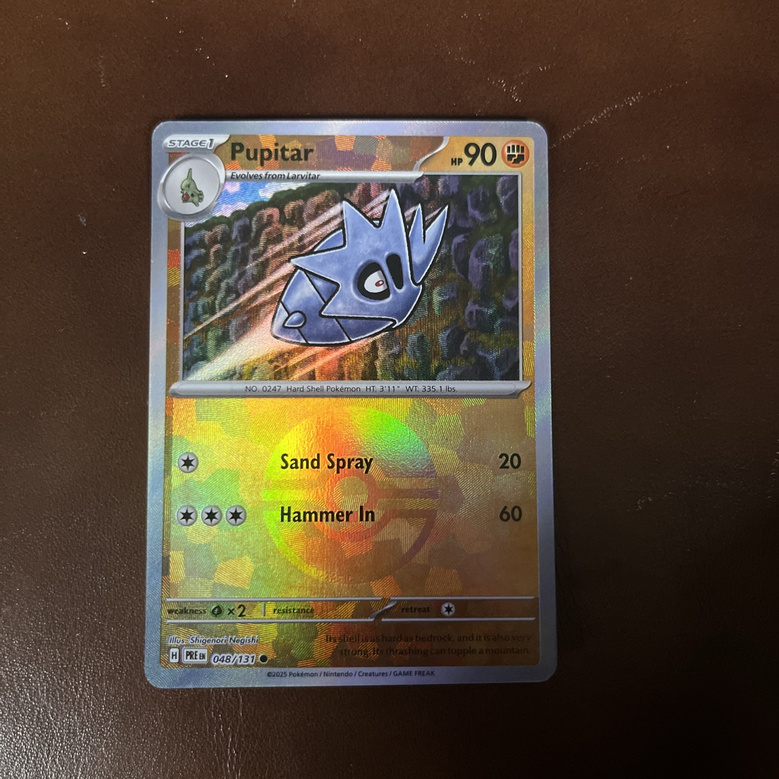 Pupitar - 048/131 - Pokemon Prismatic Evolutions - Pokeball Reverse - NM