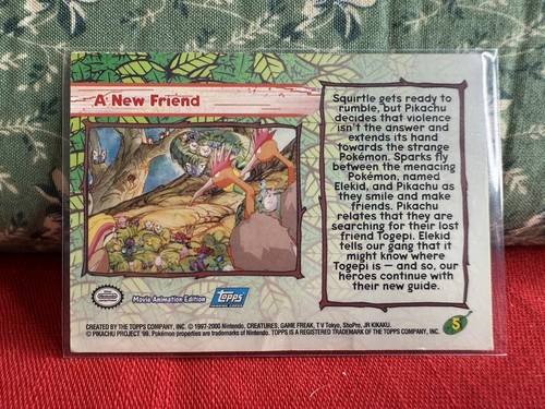 Topps Pokemon the Movie 2000 #5 A New Friend BLUE LOGO 1st EDITION DMG - Photo 2 sur 2