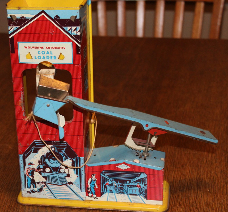 Vintage Tin Wolverine Automatic Coal Loader/ Swinging arm swings & unloads