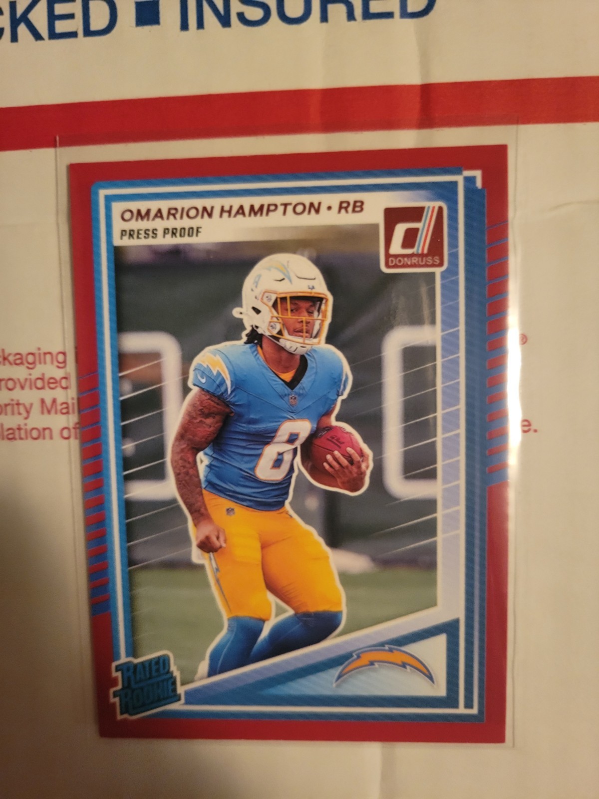 2025 Donruss Omarion Hampton Red Press Proof Rated Rookie Card