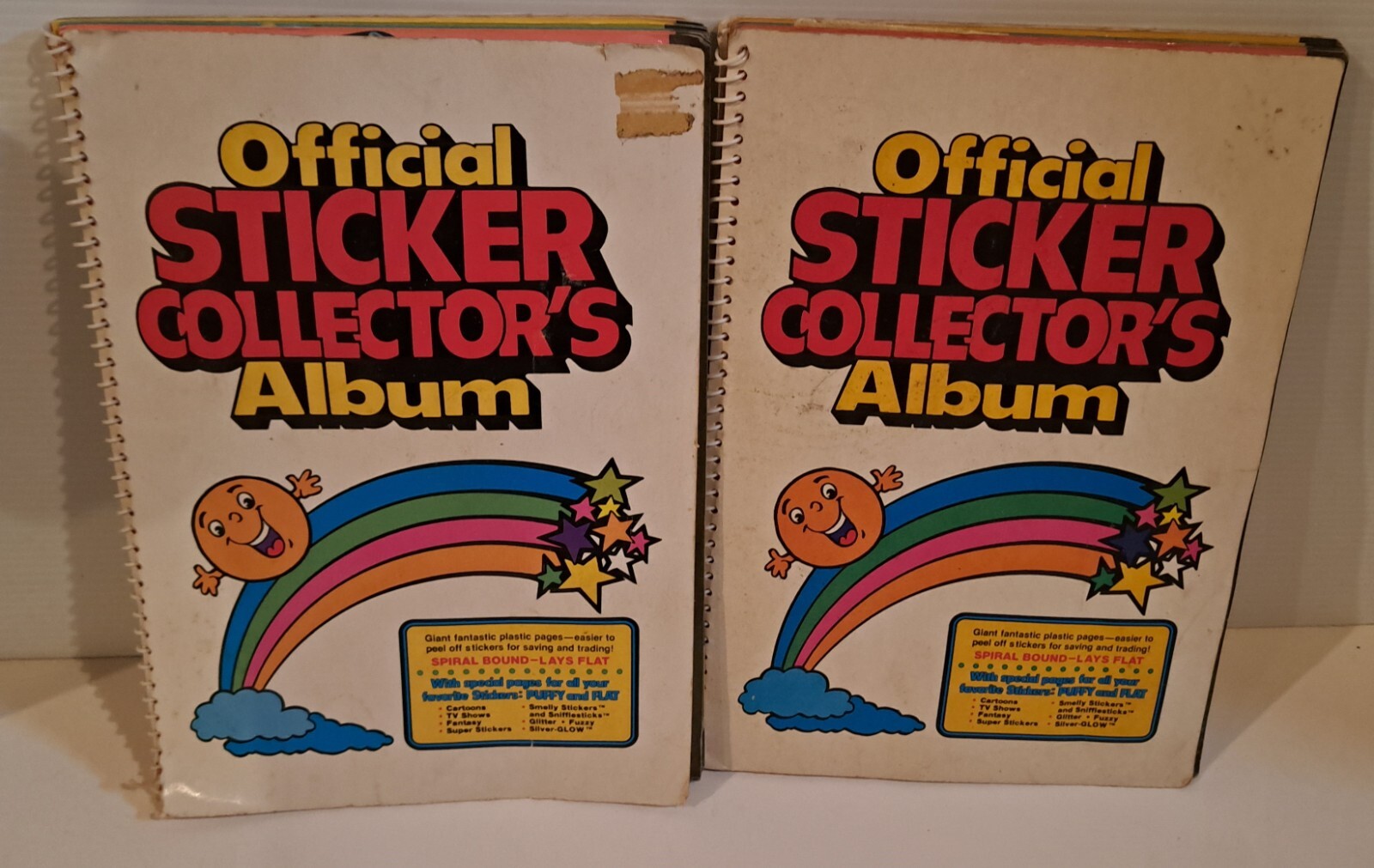 TWO Vintage 80s Gordy Official Sticker Collectors Album Scratch Sniff Prism Lot