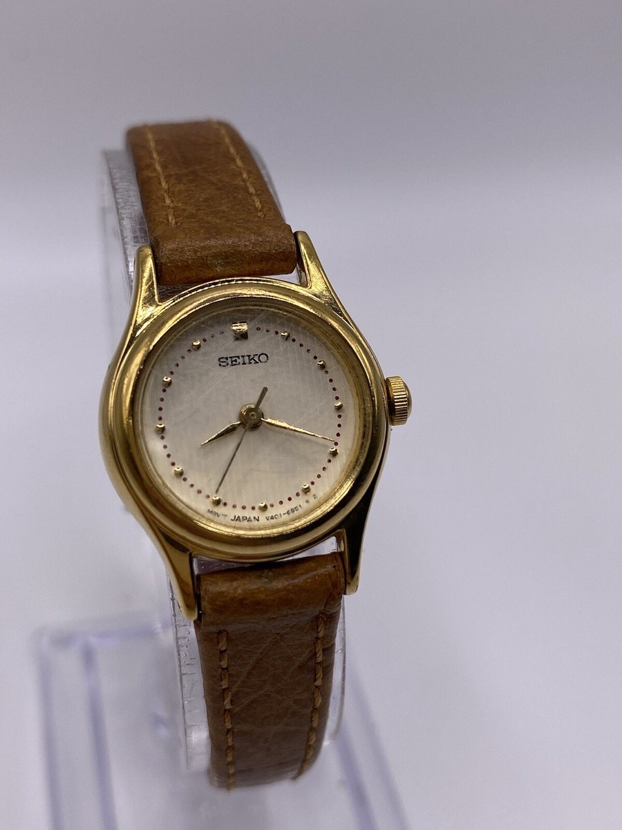Vintage Seiko V401-0920 Ladies Gold Tone Bezel Watch Leather Vintage Seiko V401-0920 Ladies Gold Tone Bezel Watch Leather