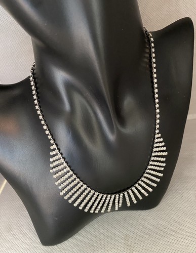 Silver toned dangly rhinestone fringe necklace