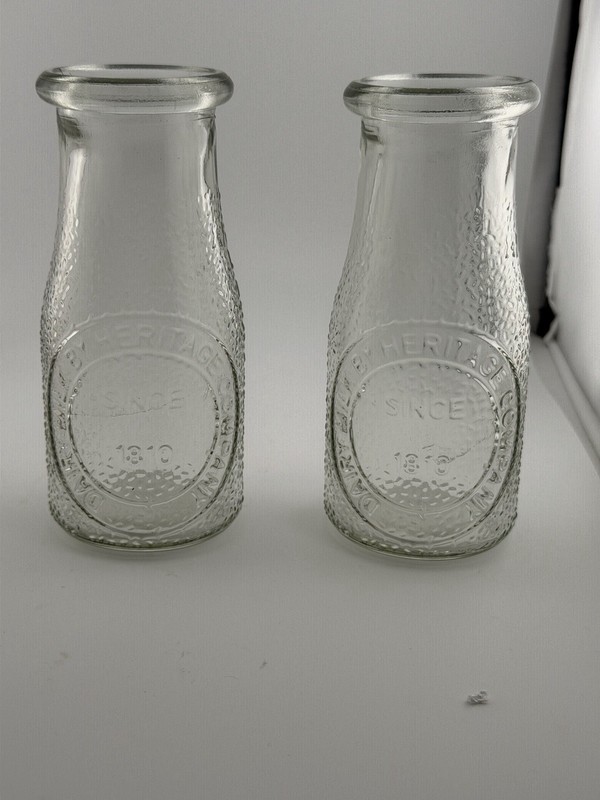 2 Clear Embossed Dairy Milk by Heritage Co Vintage Glass Bottles