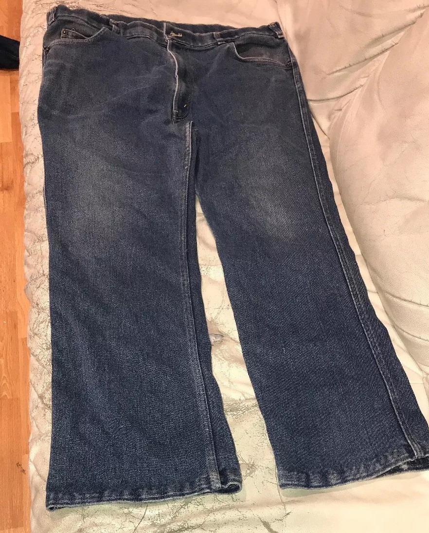 VINTAGE LEVIS FOR MEN WITH A SKOSH MORE ROOM JEANS 42” X 30