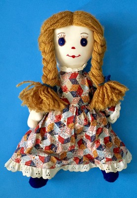 stuffed dolls with yarn hair