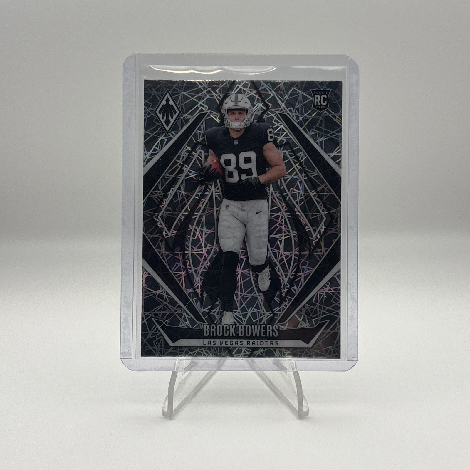 2024 Panini Phoenix - Rookies Brock Bowers #165 Lazer (RC)