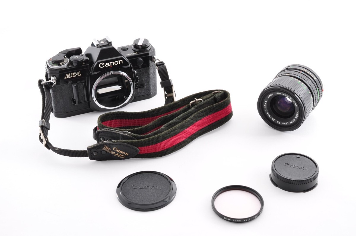 Canon AE-1 Black / Lens Zoom Lens New FD 35-70mm f/3.5 Exc+5 Canon AE-1 Black / Lens Zoom Lens New FD 35-70mm f/3.5 Exc+5