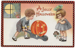 Winsch Halloween Postcard Boy pushing wheel barrow with JOL