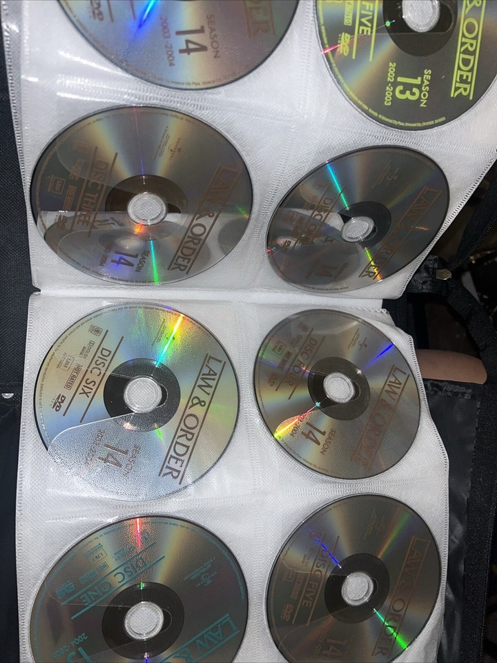 Binder of DVDs Classic TV shows and Crime Law & Order, The Equalizer