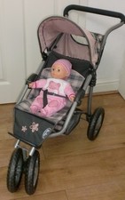 Three Wheeled Silver Cross Jogger Dolls Pram with Soft Bodied Doll