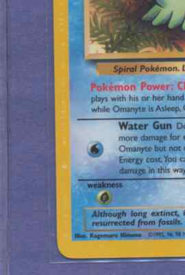 ERROR 1999 Pokemon Fossil Omanyte 52/62 PD in Left Border MINT