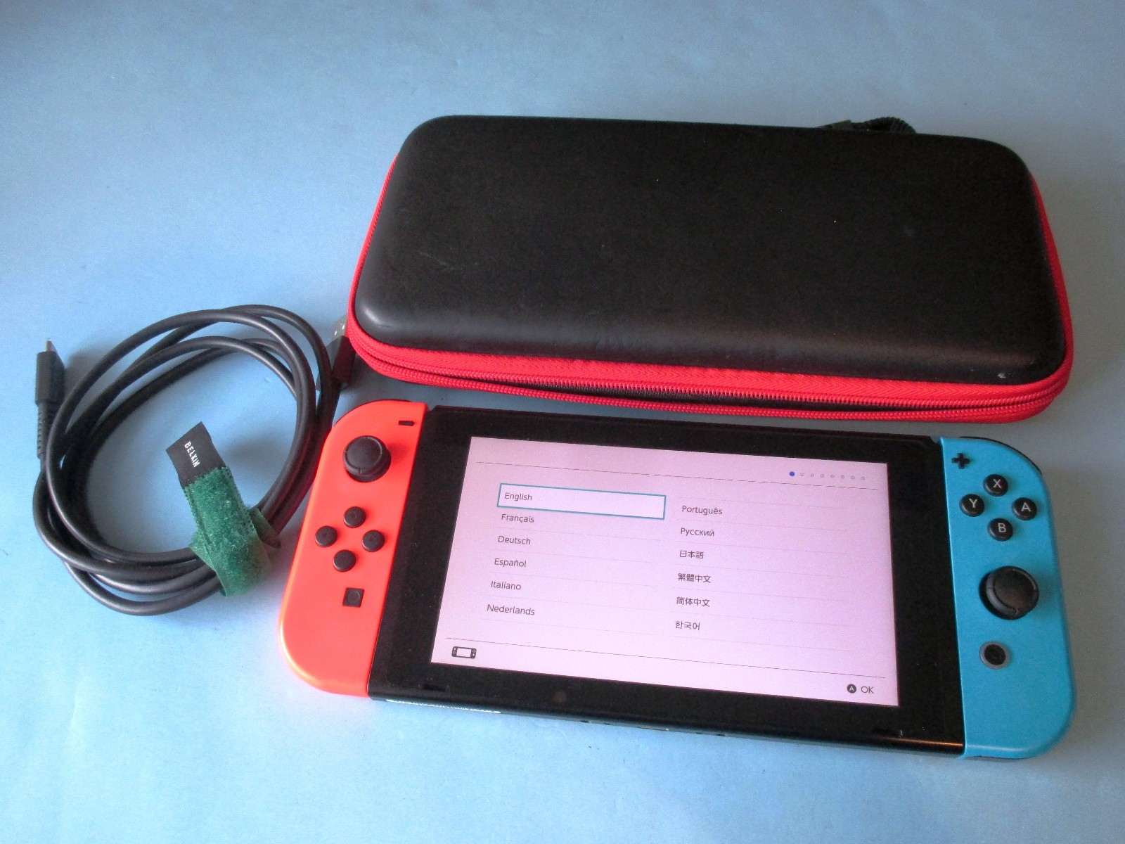 Nintendo Switch System Console w/Neon Red & Blue Joy-Cons + Case & Charger