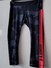 Under armor 3/4 leggings black with orange stripe size M