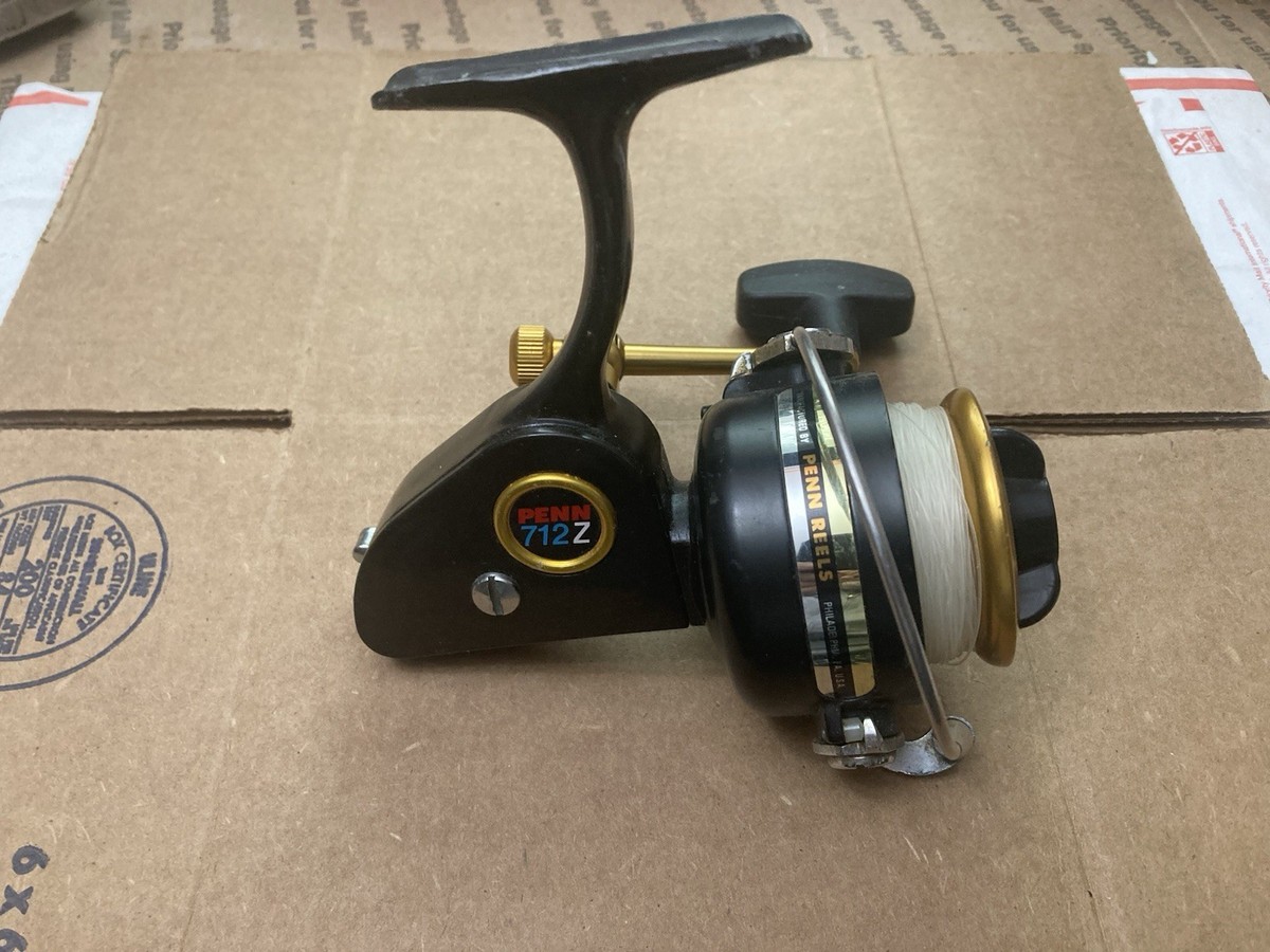 Moulinet de pêche vintage Penn 712Z noir et or avec fil ~ USA
