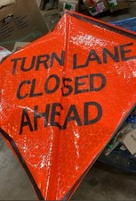 48" Reflective Fluorescent Orange Roll-Up Warning Sign. (TURN LANE CLOSED AHEAD)