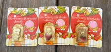 VINTAGE 1980S STRAWBERRY SHORTCAKE 2 PINS 1 NECKLACES JEWELRY