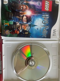 Nintendo Wii Family Bundle - 3 Wii Remotes, 3 Nunchucks, TMNT LEGO Harry Potter